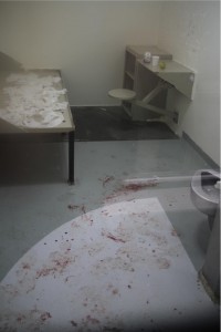 After attempting suicide, a man was returned the next day to his E Wing cell, still spattered with his blood.